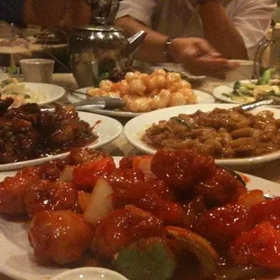 Some dishes of our dinner. Honey walnut shrimp in the back.. Don&apos;t sleep on it! It was my favorite dish of them all!