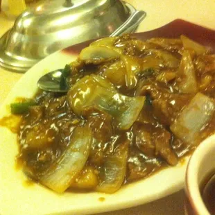 Mystery meat with even more mysterious sauce.....  It would be negative stars if that was possible.