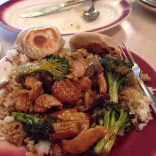Szechuan chicken And  potstickers   It was good. Old school place. Small, quiet, just like I like it.  Thumbs up.