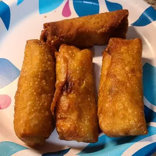 One regular egg roll and 3 Shrimp Egg Rolls. Regular egg roll overcooked but inside good.