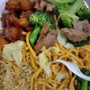 Orange chicken, beef and broccoli, rice and chow mein.