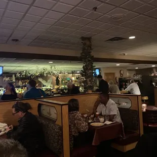 Eat dinner at the bar or a booth