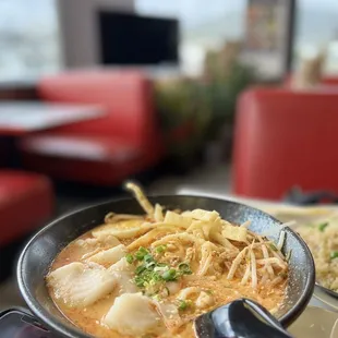 a bowl of soup with noodles