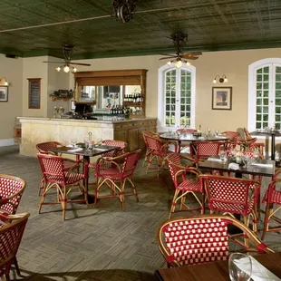 dining area with tables and chairs