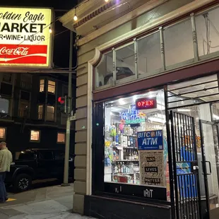 a man walking in front of the store