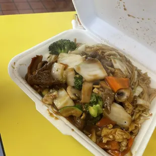 a take out container of food