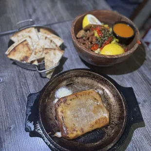 Loved the Calamari and Saganaki. As someone who&apos;s super lactose intolerant I say the cheese and pita was worth it. I had the lamb gyro.