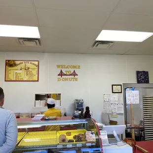 a man standing in front of the counter