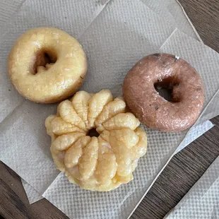 three different flavors of donuts