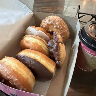 From top to bottom. Crumb-cake frosted-maple-chocolate frosted-OG Glaze. Old fashioned on the side .