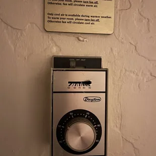Thermostat that does nothing but let you see the air conditioning you wish you had.