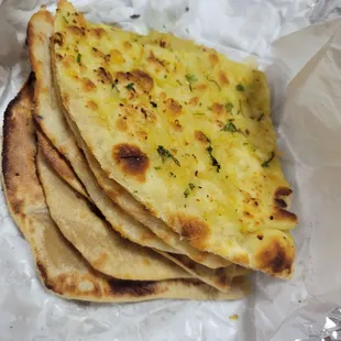 Garlic naan (paratha under it)