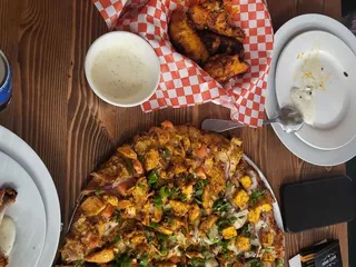 Mr. Singh's Curry Pizza