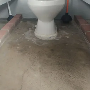 These are the floors that are porous and stained and not sealed in the men's room.