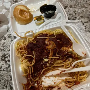 Burnt spaghetti sauce and a 2 day old roll, which by the way was supposed to be garlic bread!