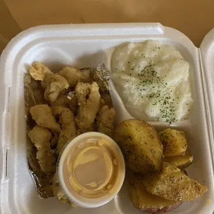 Gator, potatoes, and grits.