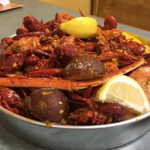 a bowl of crawfish and potatoes