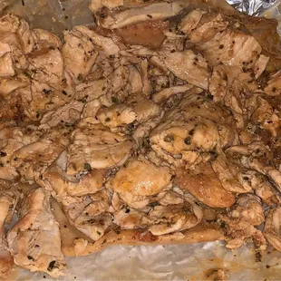 Chicken Shish Kabob Sandwich, no onions or tomatoes. Yes there is a pita soaking up all the flavorful juices underneath all that chicken.