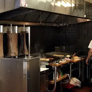Meat on a spit &amp; the grill
