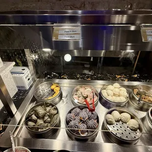 Dim Sum: Sponge Cake, Sticky Rice, Shiu Mai, Chicken Feet; Buns: Peach, Taro, Custard, Twisted Roll; IG: @katzlundell