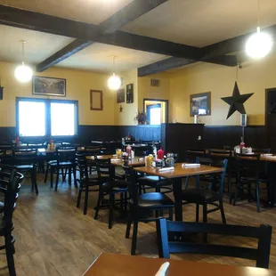 New floor, tables and chairs in the dining room