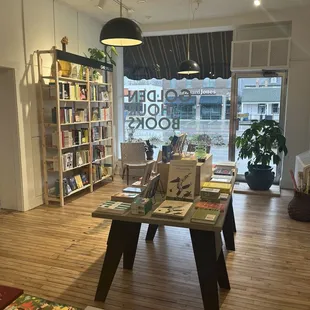 Golden Hour Books seasonal reads table and discount shelf