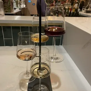 three glasses of wine on the bar