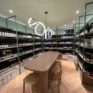 a long wooden table in a wine store