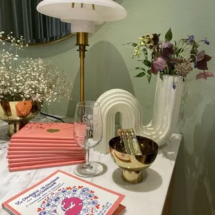 a table with napkins and flowers