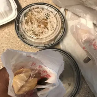 Bag with a fork,napkins,fortune cookie,duck sauce,mustard