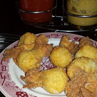 Order of yummy cream cheese blossoms. These are a MUST every time I eat here! Plum sauce &amp; super hot Chinese mustard in back.