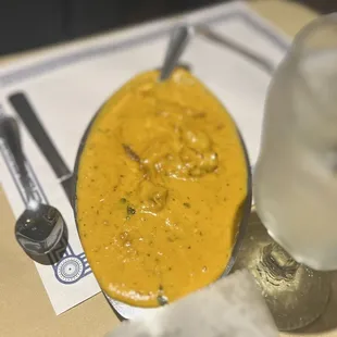 a plate of food and a glass of water