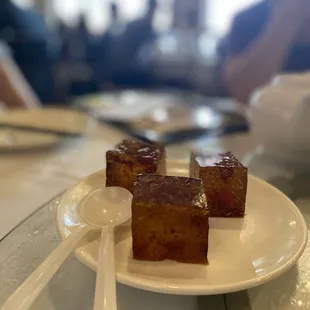 a plate of desserts on a table