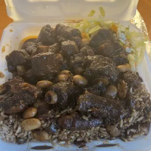 Oxtails and rice and peas