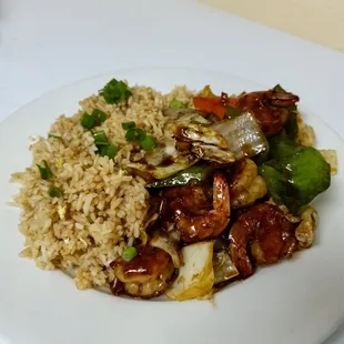 a plate of rice and vegetables