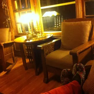 The library...filled with books, DVDs and games to borrow. (Note the homemade slippers I was able to borrow during our stay!)