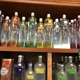 a shelf of liquor bottles