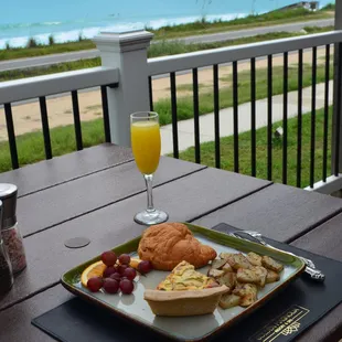 a breakfast on the deck overlooking the ocean