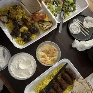 Mixed Tikka Plate, Falafel Plate, Gyro Lamb and Beef Sandwich, Taziki, and Hummus