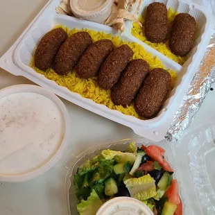 Falafel plate. Comes with pita, rice, salad, and tahini.
