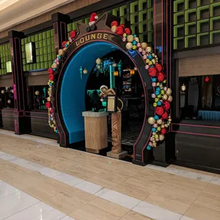 Who wouldn't want to stop in? Much nicer than the bland walkway.