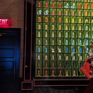 Wall of Tiki mugs for sale. Some nice designs. Unfortunately none are exclusive to Golden Monkey, just mugs you can get anywhere online.