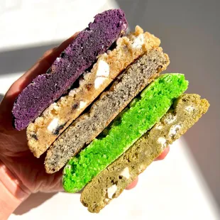 In order from top to bottom: Ube, Cookies N Cream, Black Sesame, Coconut Pandan and Matcha White Chocolate Cookies