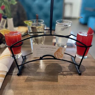 Mimosa flight. Blood orange, elderflower, lavender lemonade, strawberry Bellini