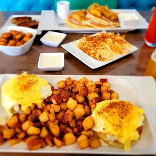 Top: Pancakes with apples, hashbrowns, sausage side, cheese curds