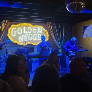 a band playing on stage