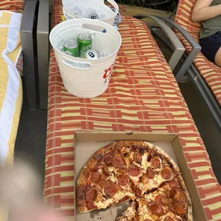 Pizza and bucket of beer