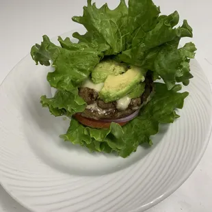 Lettuce wrap avocado cheese burger.
