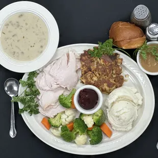 Fresh Roast Turkey dinner includes steam vegetables, bread, homemade soup or salad ,homemade stuffing, gravy &amp; potato choice.