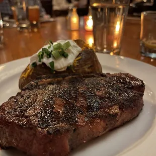 Bone in KC strip and loaded baked potato